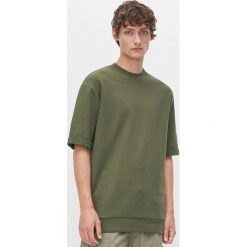 T-shirt z bawełny organicznej - Zielony. Zielone t-shirty damskie Reserved, s, bez wzorów, z bawełny, bez kołnierzyka. Za 79,99 zł.