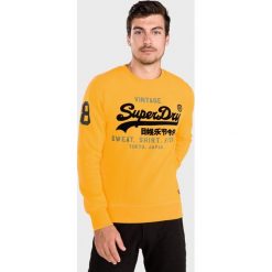 SuperDry Bluza Żółty. Żółte bluzy męskie Superdry, xl, z nadrukiem, z bawełny, bez kołnierzyka, bez rękawów, bez kaptura. Za 312,95 zł.