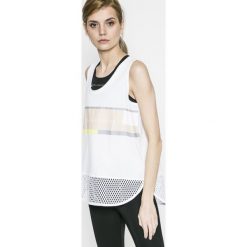Adidas by Stella McCartney - Top. Szare topy sportowe damskie marki adidas by Stella McCartney, l, z aplikacjami, z bawełny, z okrągłym kołnierzem. W wyprzedaży za 179,90 zł.