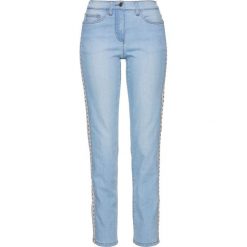 Dżinsy z ozdobnymi paskami i ćwiekami bonprix niebieski "bleached”. Niebieskie jeansy damskie marki bonprix, z jeansu. Za 99,99 zł.