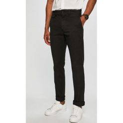 Calvin Klein - Spodnie. Czarne spodnie męskie Calvin Klein, na co dzień, bez wzorów, z elastanu. W wyprzedaży za 269,90 zł.