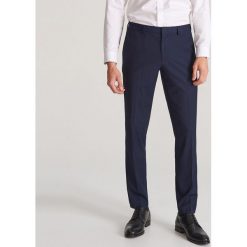 Spodnie garniturowe slim fit - Granatowy. Niebieskie spodnie garniturowe męskie Reserved, bez wzorów. Za 149,99 zł.
