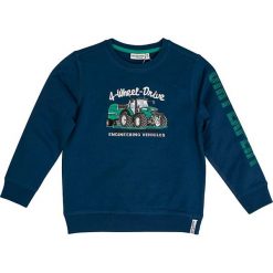 Bluza "Tractor" w kolorze granatowym. Niebieskie bluzy niemowlęce Salt and Pepper, z nadrukiem, bez rękawów, bez kaptura. W wyprzedaży za 32,95 zł.