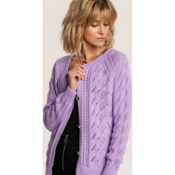 Lawendowy Sweter Lariliana. Fioletowe swetry damskie Renee, uniwersalny, bez wzorów, bez rękawów, bez kaptura. Za 129,99 zł.