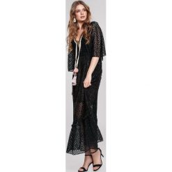 Czarna Sukienka Adjective. Czarne sukienki damskie other, s, z aplikacjami, boho, bez kołnierzyka, bez rękawów, maxi, dopasowane. Za 199,99 zł.