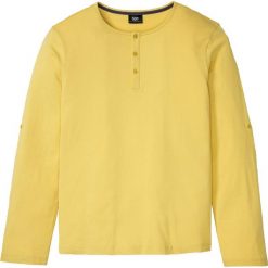 Shirt z dekoltem henley, długi rękaw bonprix żółty curry. Pomarańczowe koszulki męskie bonprix, s, bez wzorów, bez kołnierzyka, z długim rękawem, długie. Za 49,99 zł.