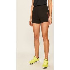 Calvin Klein Performance - Szorty. Czarne spodenki sportowe damskie Calvin Klein Performance, s, z nadrukiem, z elastanu, sportowe. Za 229,90 zł.