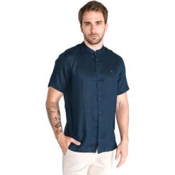 Tommy Hilfiger Koszula Niebieski. Niebieskie koszule męskie TOMMY HILFIGER, l, bez wzorów, ze lnu, bez kołnierzyka, z krótkim rękawem. Za 430,95 zł.