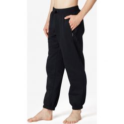 Spodnie dresowe Gym & Pilates 500 męskie. Czarne spodnie męskie DOMYOS, xl, bez wzorów, z elastanu, sportowe. Za 69,99 zł.
