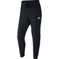 Nike NSW Pant CF JSY Club 804461-010. Czarne spodnie męskie Nike, m, bez wzorów, z bawełny. W wyprzedaży za 159,99 zł.