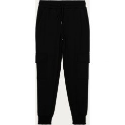 Lmtd - Spodnie dziecięce 140-176 cm. Czarne dresy chłopięce LMTD, bez wzorów, z elastanu. Za 169,90 zł.