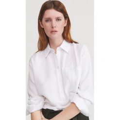 Gładka tunika z Tencelu™ - Kremowy. Białe tuniki damskie Reserved, s, bez wzorów, bez kołnierzyka, bez rękawów. Za 99,99 zł.
