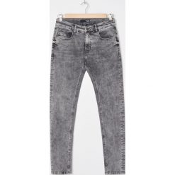 Jeansy skinny - Jasny szary. Szare jeansy męskie House, bez wzorów. Za 99,99 zł.
