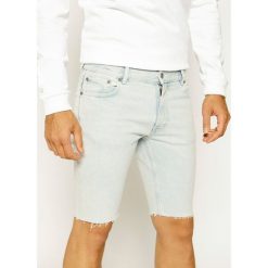 Szorty jeansowe TOMMY HILFIGER LEWIS HAMILTON MW0MW13716. Niebieskie spodenki i szorty męskie TOMMY HILFIGER, m, bez wzorów, z elastanu. Za 549,00 zł.
