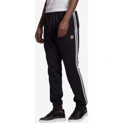 Adidas Originals Adicolor Classics Primeblue SST Spodnie dresowe Czarny. Czarne spodnie męskie adidas Originals, xxl, bez wzorów, z bawełny. Za 266,95 zł.