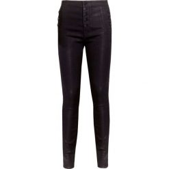 Jeansy J BRAND NATASHA HIGH RISE SKINNY. Czarne jeansy damskie J Brand, bez wzorów, z jeansu, z podwyższonym stanem. Za 1860,00 zł.