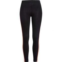 Legginsy z lampasami bonprix czarny w kolorowe paski. Czarne legginsy damskie bonprix, w paski. Za 54,99 zł.