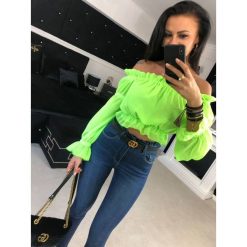 Bluzka ,,N.V SPRING’’ seledyn. Bluzki damskie Divino style, na co dzień, s, bez wzorów, z poliesteru, bez kołnierzyka, bez rękawów. W wyprzedaży za 69,00 zł.