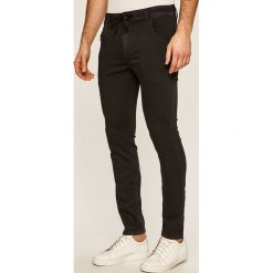 Diesel - Jeansy Krooley CB-NE Sweat jeans. Czarne jeansy męskie Diesel, bez wzorów. W wyprzedaży za 449,90 zł.