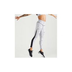 Legginsy fitness cardio 900 damskie. Białe legginsy sportowe damskie DOMYOS, xl, w paski, z elastanu, na fitness i siłownię. Za 99,99 zł.