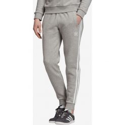 Adidas Originals Spodnie dresowe Szary. Szare spodnie męskie adidas Originals, s, bez wzorów, z bawełny. Za 266,95 zł.