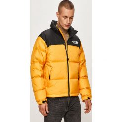 The North Face - Kurtka puchowa. Pomarańczowe płaszcze męskie The North Face, s, bez wzorów, z nylonu, krótkie, bez kaptura. Za 1199,00 zł.