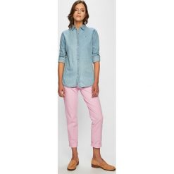 Tommy Hilfiger - Spodnie. Różowe spodnie damskie TOMMY HILFIGER, bez wzorów, z elastanu. W wyprzedaży za 269,90 zł.