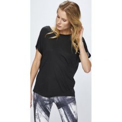 Reebok - Top. Czarne topy damskie marki Reebok, s, z dzianiny, z okrągłym kołnierzem. W wyprzedaży za 129,90 zł.