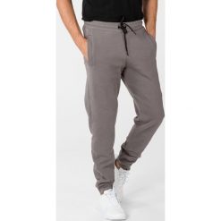 Trussardi Jeans Spodnie dresowe Szary. Szare spodnie męskie Trussardi Jeans, l, bez wzorów, z bawełny. Za 404,95 zł.