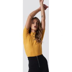 Trendyol Knitted Button Detailed Top - Yellow. Żółte topy damskie marki Trendyol, bez wzorów, z materiału, bez kołnierzyka. Za 80,95 zł.