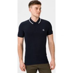 Calvin Klein Essentials Polo Koszulka Niebieski. Niebieskie podkoszulki męskie Calvin Klein, xxl, bez wzorów, z elastanu, polo, bez rękawów. Za 290,95 zł.