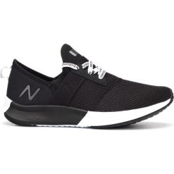 New Balance Tenisówki Czarny. Czarne trampki i tenisówki damskie New Balance, bez wzorów, z materiału, bez zapięcia. Za 274,95 zł.