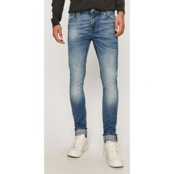 Guess Jeans - Jeansy. Niebieskie jeansy męskie Guess Jeans, m, z aplikacjami. Za 369,90 zł.