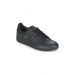 Buty Dziecko adidas GAZELLE J. Czarne trampki dziewczęce Adidas, bez wzorów, bez zapięcia. Za 207,20 zł.