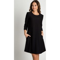 Sukienka typu parasolka z rękawami 3/4 BIALCON. Żółte sukienki damskie BIALCON, na co dzień, uniwersalny, bez wzorów, eleganckie, bez kołnierzyka, bez rękawów, rozkloszowane. W wyprzedaży za 234,00 zł.