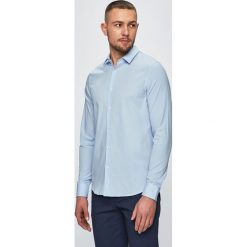 Calvin Klein Jeans - Koszula. Niebieskie koszule męskie Calvin Klein Jeans, s, bez wzorów, z elastanu, klasyczne, z klasycznym kołnierzykiem, z długim rękawem. W wyprzedaży za 239,90 zł.