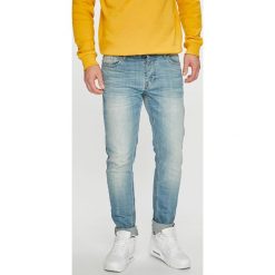 Dickies - Jeansy. Szare jeansy męskie z dziurami marki Dickies, z bawełny. Za 299,90 zł.