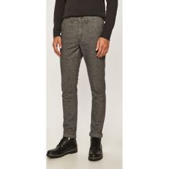 Jack & Jones - Spodnie. Szare spodnie męskie Jack & Jones, na co dzień, bez wzorów, z elastanu. W wyprzedaży za 179,90 zł.