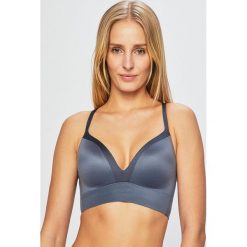 Triumph - Biustonosz. Szare biustonosze Triumph, bez wzorów, z elastanu. W wyprzedaży za 119,90 zł.