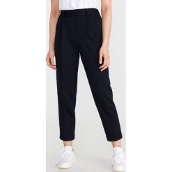 Tommy Hilfiger Essential Spodnie Niebieski. Niebieskie spodnie damskie TOMMY HILFIGER, z poliesteru. Za 462,95 zł.