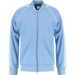 Kurtki sportowe męskie: adidas Originals ADICOLOR SST Kurtka sportowa ashblu
