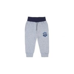 Spodnie niemowlęce chłopięce sportowe. Szare spodnie niemowlęce TXM, bez wzorów, sportowe. Za 19,99 zł.