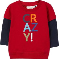 Bluza "Olli" w kolorze czerwonym. Czerwone bluzy niemowlęce marki name it boys, z bawełny. W wyprzedaży za 37,95 zł.