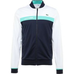 Lacoste Sport TENNIS JACKET Kurtka sportowa white/navy blue/papeete. Białe kurtki sportowe męskie Lacoste Sport, m, z materiału. Za 499,00 zł.