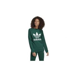 Bluzy adidas SUDADERA ORIGINAL TRF CREW SWEAT DV2623. Zielone bluzy damskie Adidas, bez wzorów, bez rękawów, bez kaptura. Za 208,62 zł.