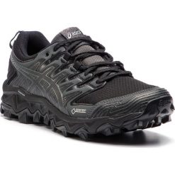 Buty ASICS - Gel-FujiTrabuco 7 G-TX GORE-TEX 1012A190 Black/Dark Grey 1. Czarne buty sportowe damskie Asics, bez wzorów, ze skóry ekologicznej, sportowe, do biegania, gore-tex. Za 619,00 zł.