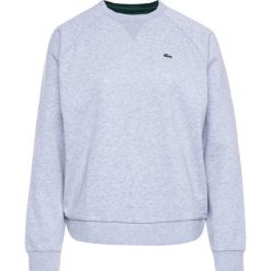 Bluza Lacoste SF5456. Niebieskie bluzy damskie Lacoste, bez wzorów, z bawełny, bez rękawów, bez kaptura. Za 539,00 zł.