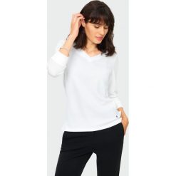 Elegancka bluzka z dzianiny strukturalnej. Bluzki damskie Greenpoint, bez wzorów, z elastanu, eleganckie, bez kołnierzyka, bez rękawów. Za 79,99 zł.