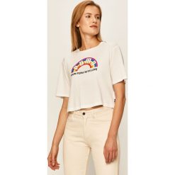 Puma - T-shirt. Białe bluzki damskie Puma, s, z nadrukiem, z bawełny, casualowe, z okrągłym kołnierzem, z krótkim rękawem. Za 129,90 zł.