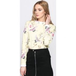 Jasnożółta Bluzka Flowery. Żółte bluzki asymetryczne Born2be, s, z długim rękawem. Za 59,99 zł.